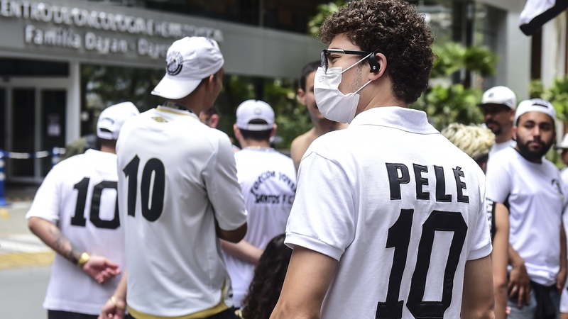 Fans hold a vigil in support of Pele outside Albert Einstein Israeli Hospital in Sao Paulo