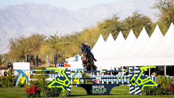 Daniel Coyle and Legacy negotiate a jump in Thermal in the foothills of the Santa Rosa Mountains