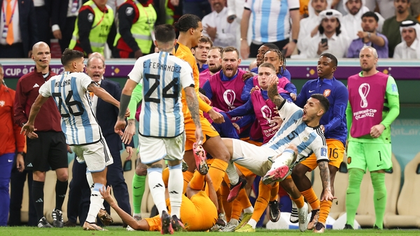 Virgil Van Dijk barging over Leandro Parades after the latter slammed a ball into the Dutch dugout