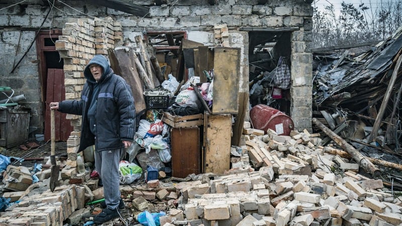 A man tries to recover his belongings of his total destroyed home in a rocket impact after a russian shelling over Kostiantynivka, a village in Donbass region