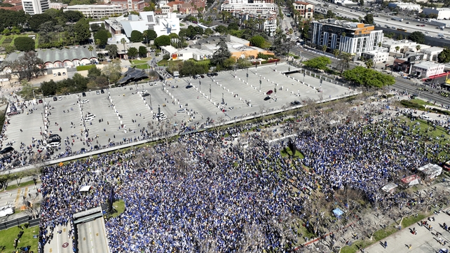 16 February: An aerial view with a view of downtown Los Angeles of crowds celebrating the Los Angeles Rams Super Bowl Championship parade and rally