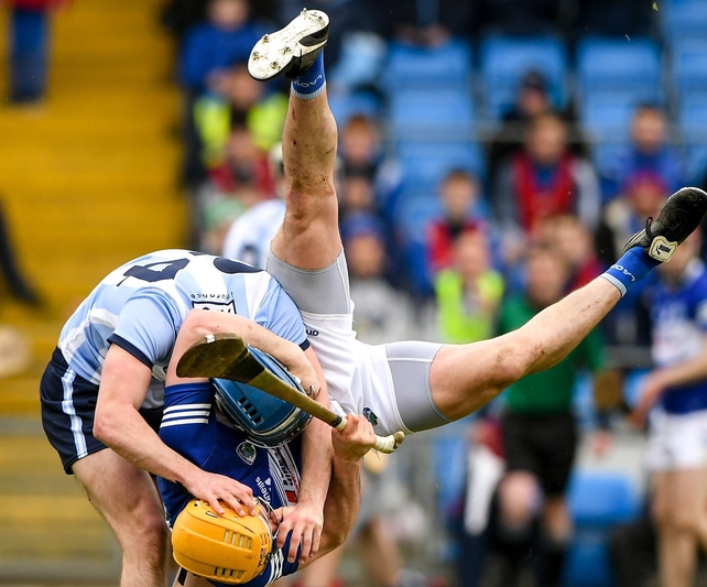 20 March: Riain McBride of Dublin tussles with Charles Dwyer of Laois before being shown a red card during Allianz Hurling League game at O'Moore Park