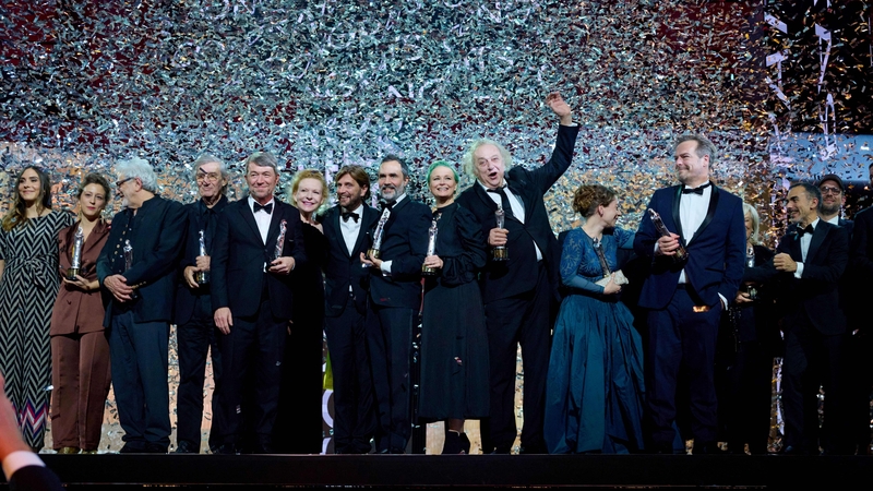 Actor Zlatko Buric (arm raised) celebrates on stage at the 35th European Film Awards in Reykjavik (Photo: Getty)
