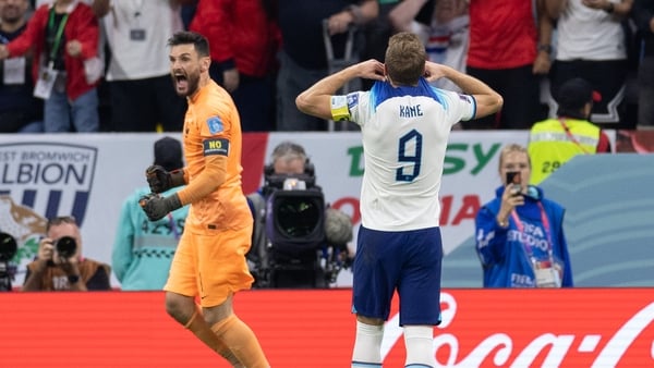 Hugo Lloris and Harry Kane react after the England captain's penalty miss