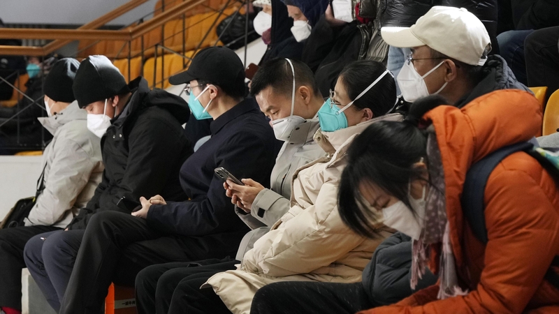 There are increasing signs of chaos during China's change of tack - with long queues outside fever clinics, runs on medicines and panic buying across the country