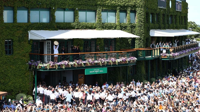 9 July: Elena Rybakina shows the trophy off to the crowd after winning the women's singles at Wimbledon