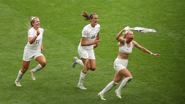 31 July: Chloe Kelly of England celebrates with teammates Jill Scott and Lauren Hemp after scoring the winning goal in the Euro 2022 Women's final at Wembley