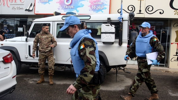 Irish troops at the site of the attack in Al-Aqbiya