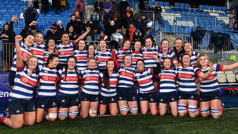 Blackrock College players celebrate with the trophy