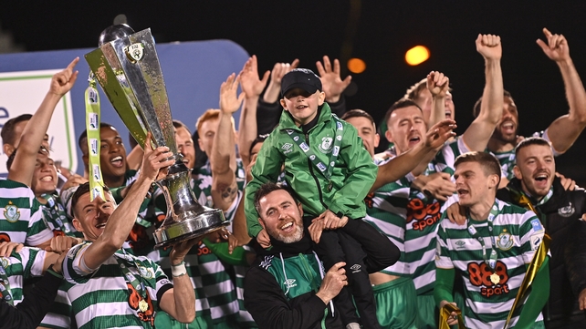 30 October: Shamrock Rovers captain Ronan Finn lifts the Premier Division trophy, alongside manager Stephen Bradley, and his son Josh