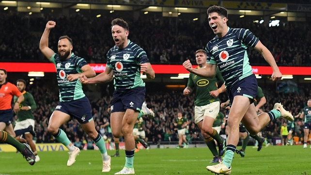 5 November: Ireland players, from right, Jimmy O'Brien, Hugo Keenan and Jamison Gibson-Park celebrate a try scored by Mack Hansen in test against South Africa
