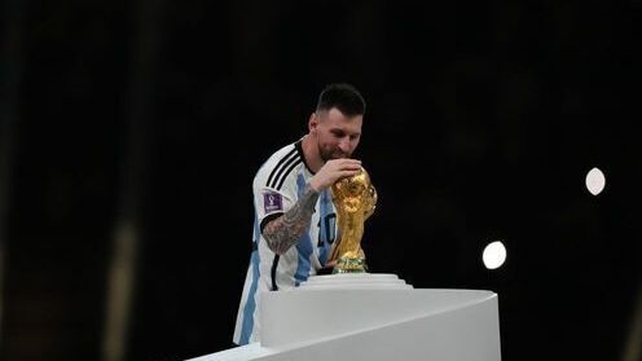 18 December: Lionel Messi kissing the World Cup