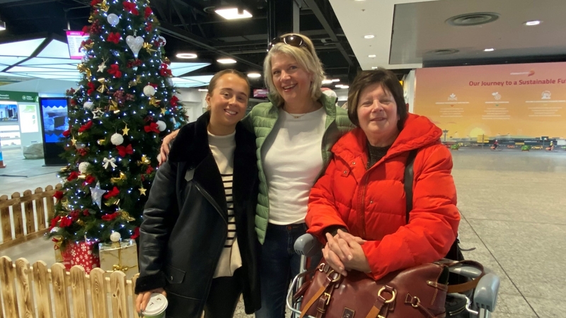 Grainne Flynn and Mary Collins from Abbeyfeale welcome home their sister and aunt Bríd, who just arrived in Shannon Airport having travelled home from Sydney via London Heathrow - her first time home since 2019.
