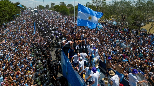 Argentina players on the open-top bus before the journey was sent to the skies of Buenos Aires