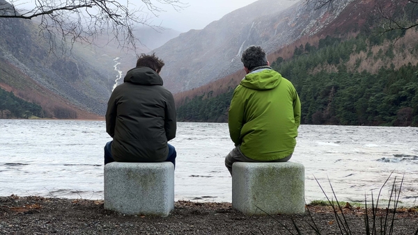 Artists Richard Healy and Frank Corry take in the view at the 'Suí' art project installation in Glendalough, Co Wicklow