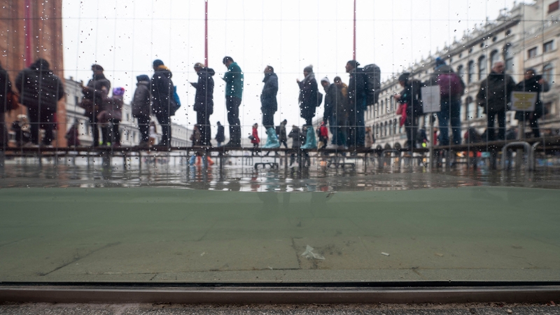 Glass barriers installed around the 900-year-old church help to keep it dry
