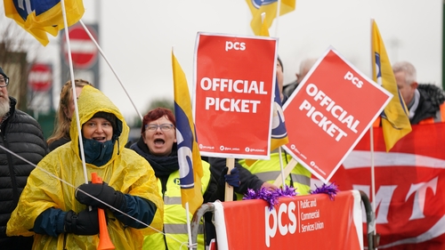 Members of the Public and Commercial Services (PCS) union on the picket line outside Birmingham Airport
