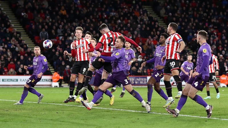 Ciaran Clark of Sheffield United scores