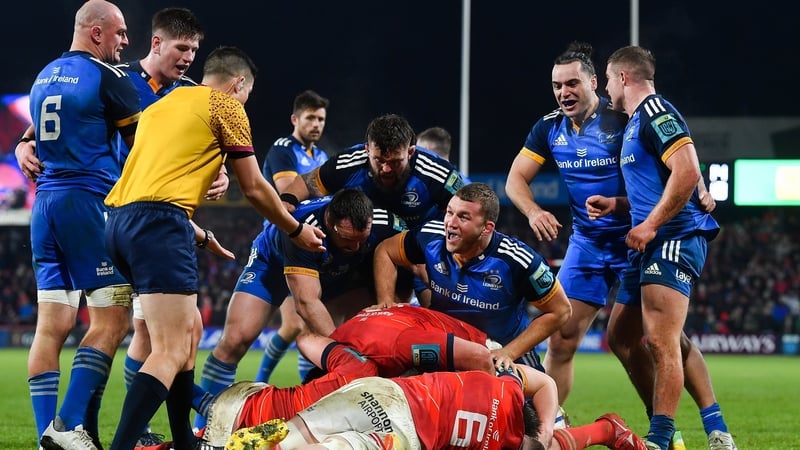 The Leinster players celebrate after Dan Sheehan (hidden) scores from a close range tap penalty