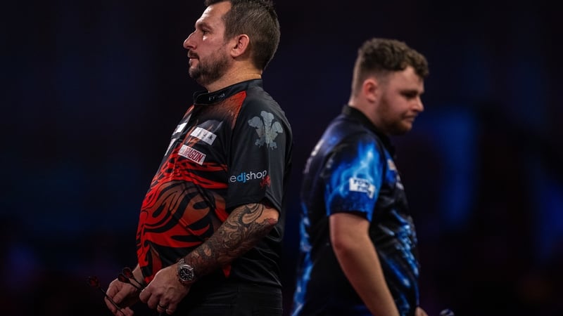 Josh Rock (R) was reeled in by Jonny Clayton