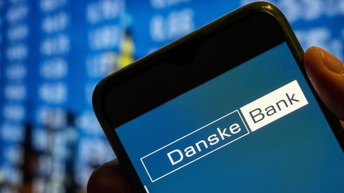 Danske Bank has raised its full-year net profit forecast due to more favourable macroeconomic conditions