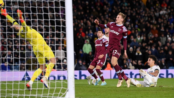 Lukasz Fabianski saves from Rodrigo Moreno of Leeds United