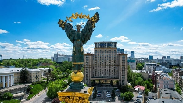 Ukrainians sing national anthem amid Russian strikes