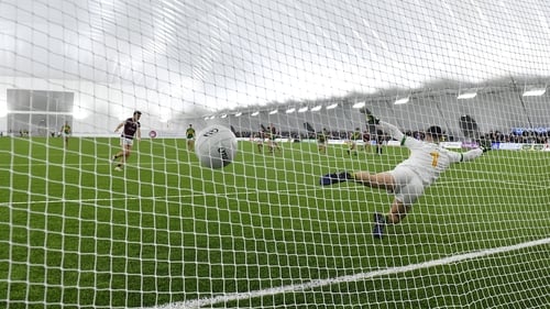 Rob Finnerty converts from the spot in the Dome