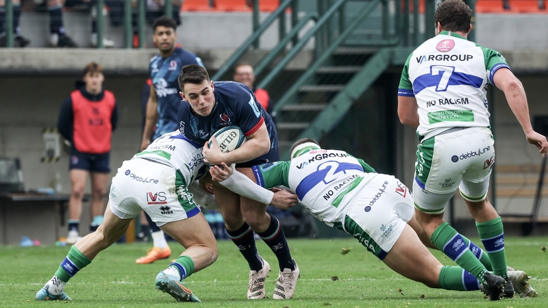 James Hume of Ulster is tackled by Tommaso Menoncello and Giacomo Nicotera