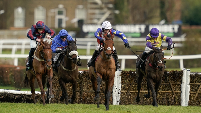 Harry Cobden on Tahmuras (white cap) clear the last to win the Sandown feature