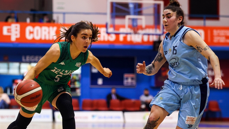 DCU Mercy's Lindsey Abed (R) tracks Dayna Finn of Trinity Meteors