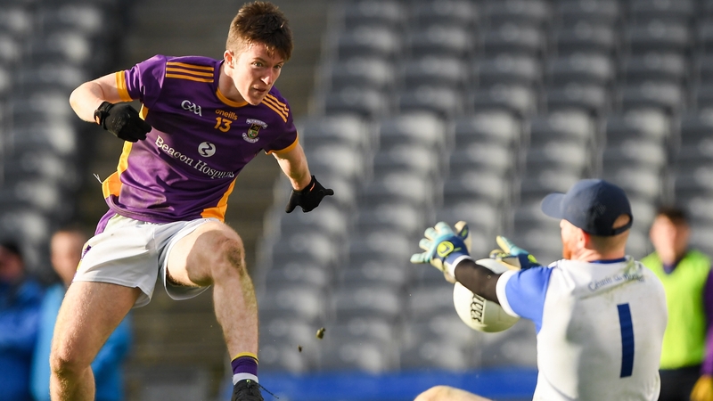 Hugh Kenny of Kilmacud Crokes in action against Kerins O'Rahilly's goalkeeper Shane Foley