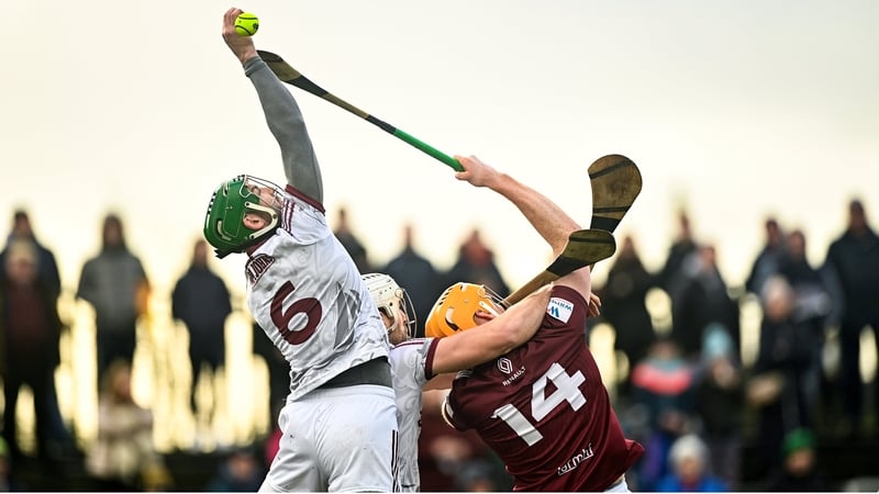Galway's Adrian Tuohy rises for a fetch over Niall Mitchell of Westmeath