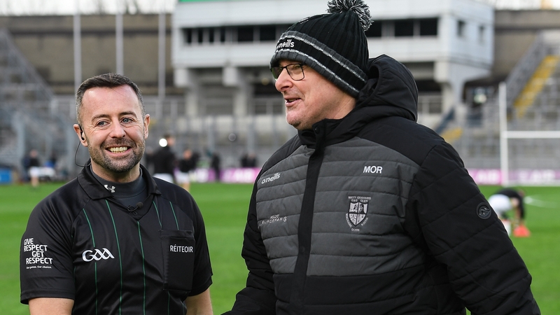 Malachy O'Rourke shakes hands with referee David Gough after the match