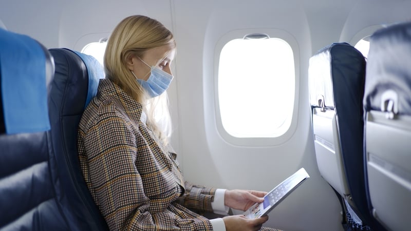 WHO says passengers should be advised to wear face masks on long flights