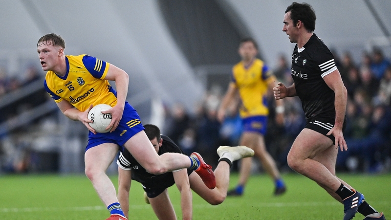 Paul Carey gets past Paul Kilcoyne and Darragh Cummins