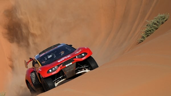 French driver Sebastien Loeb and Belgian co-driver Fabian Lurquin steer their BRX during stage 13