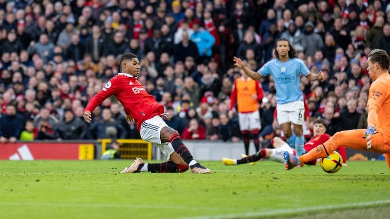 Marcus Rashford scores the equaliser against Man City