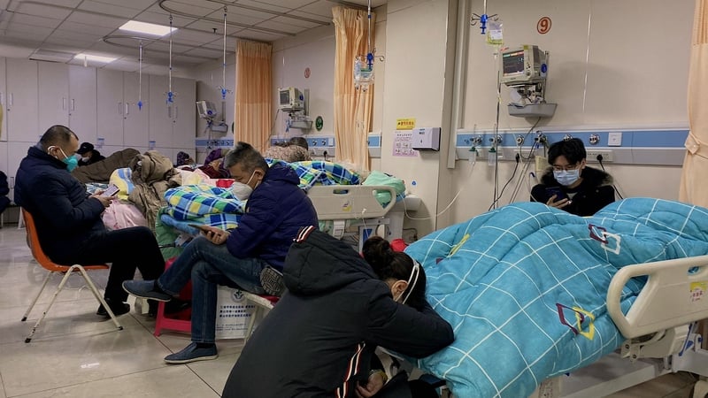 Patients with Covid-19 lie in beds at Tangshan Gongren Hospital in China's northeastern city of Tangshan