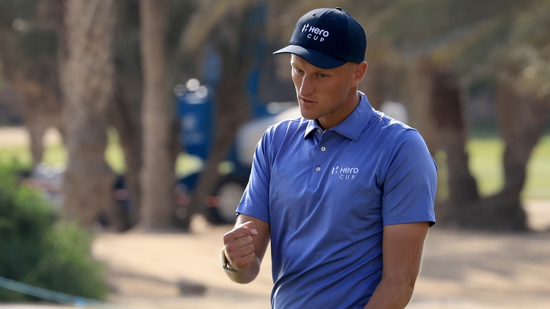 Adrian Meronk celebrates his par on 18 which secured the title for Continental Europe
