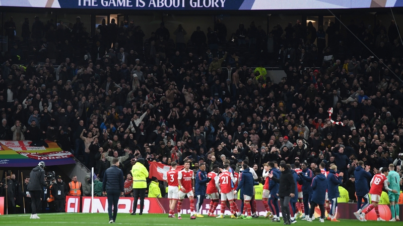 Arsenal fans celebrate being top of the league at Tottenham Hotspur Stadium, of all places