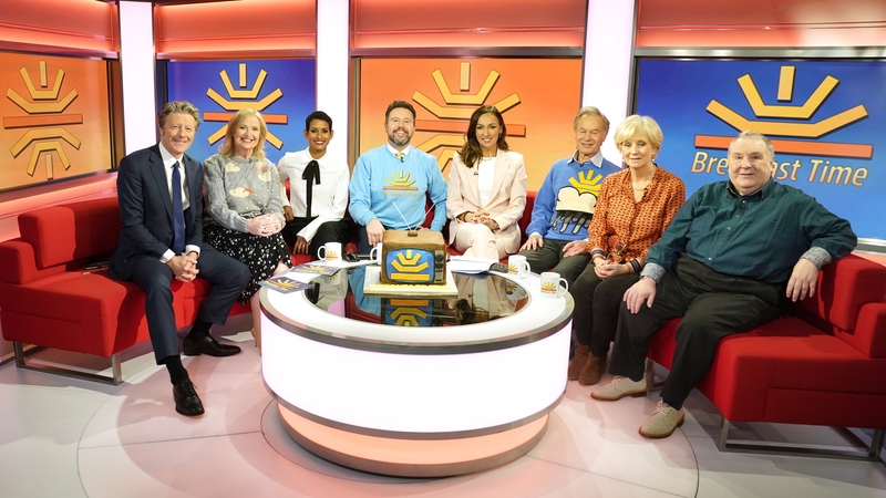 Charlie Stayt, Carol Kirkwood, Naga Munchetty, Jon Kay, Sally Nugent, Francis Wilson, Debbie Rix and Russell Grant on the red sofa as BBC Breakfast celebrate its 40th anniversary