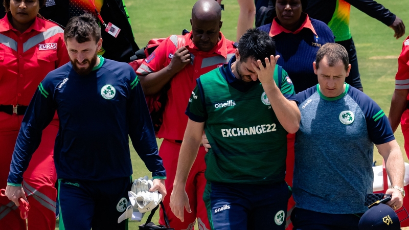 Balbirnie (C) to walk off the pitch after sustaining the injury