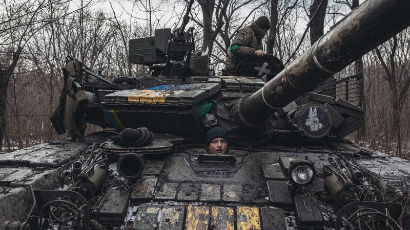 Ukrainian tankers carry out maintenance on their tanks on the Donbas frontline
