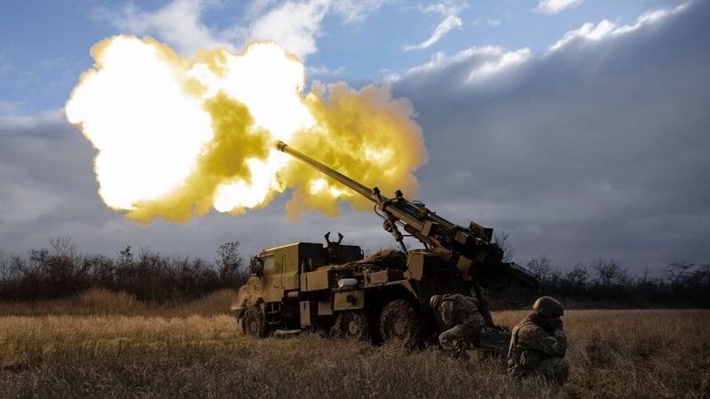 Ukrainian servicemen fire with a Caesar self-propelled howitzer towards Russian positions in eastern Ukraine
