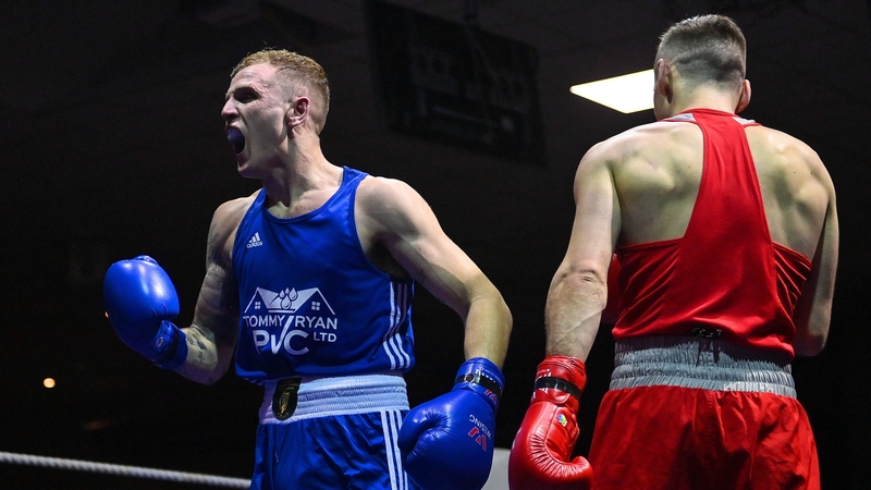 Dean Walsh (L) celebrates his win against Aidan Walsh