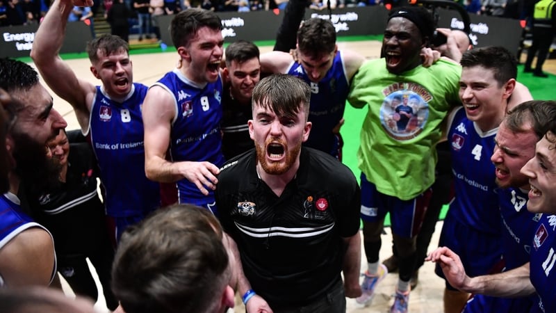 University of Galway Maree head coach Charlie Crowley and his players react after their win