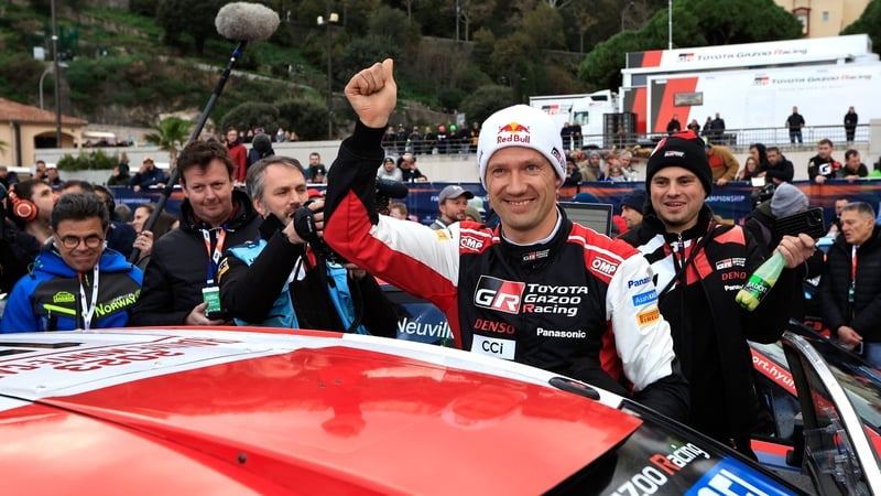 Sebastien Ogier celebrates his victory