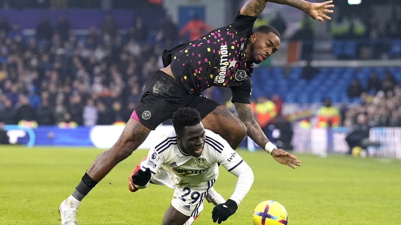 Ivan Toney of Brentford and Leeds United's Willy Gnonto battle for possession