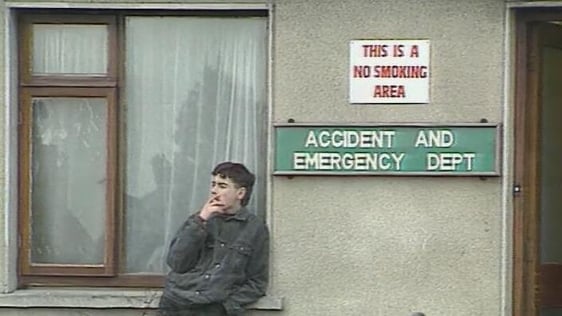 Man smoking outside hospital A&E department (1993)